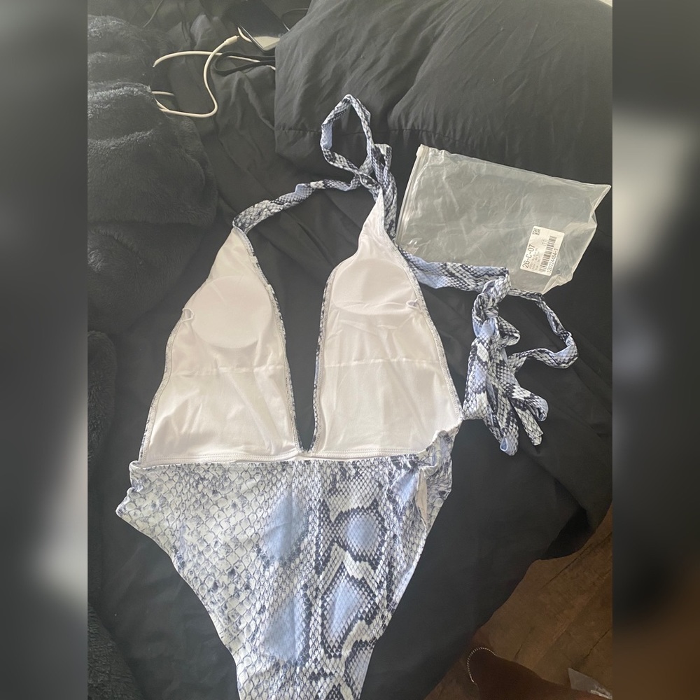 Snake print. Sky blue sexy swimsuit